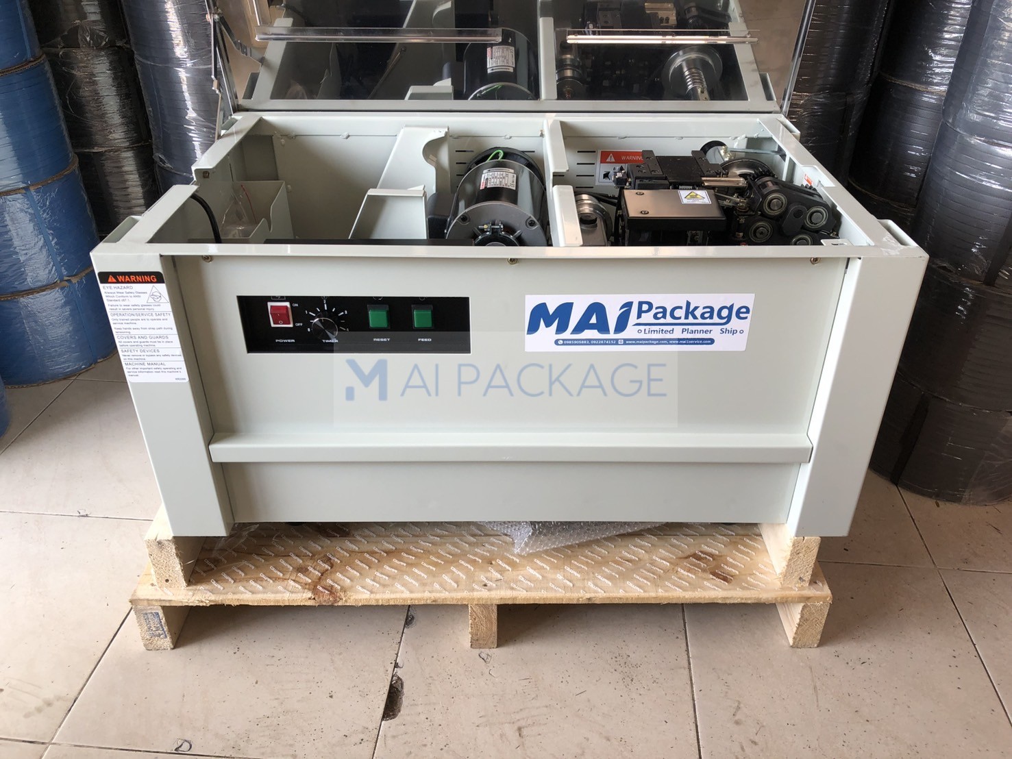 เครื่องรัดกล่อง,เครื่องรัดกล่องรุ่นJN-740L,เครื่องรัดสายรัดพลาสติก